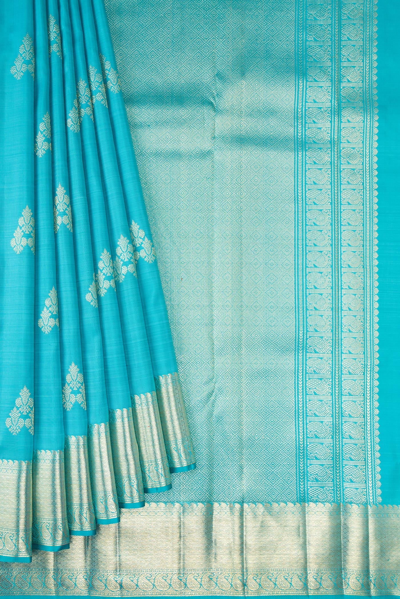 Pleats and pallu of Light Blue Kanjivaram Silk Saree with Zari Butta on the body and Zari Border. 