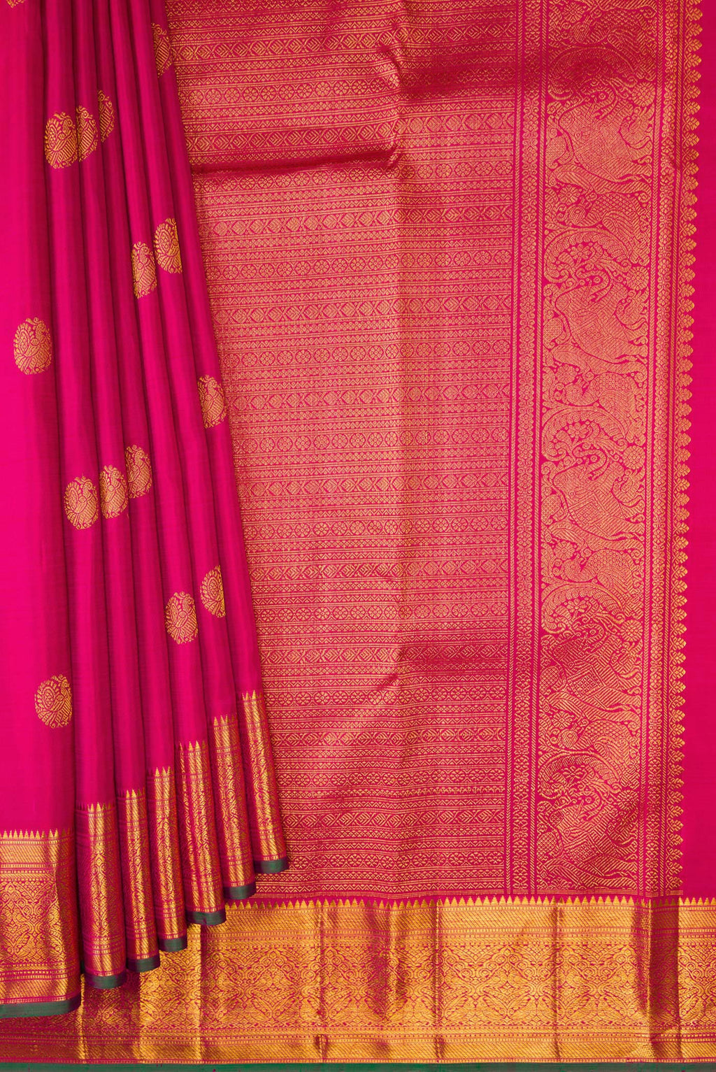 Pleats and pallu of Pink Kanjivaram Silk Saree with Zari Butta on the body and Zari Border. 