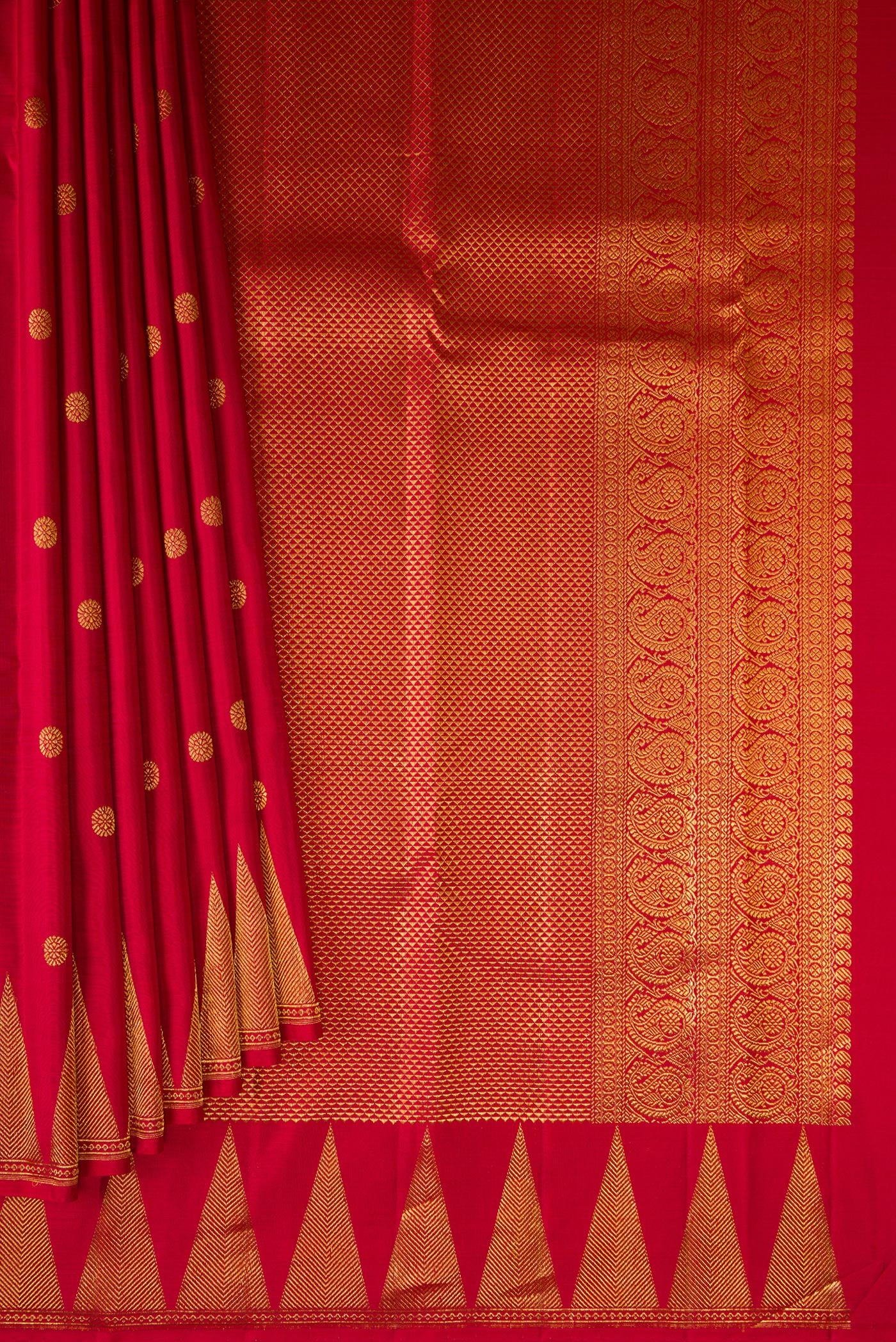 Pleats and pallu of Red Kanjivaram Silk Saree with Zari Butta on the body and Temple Border. 