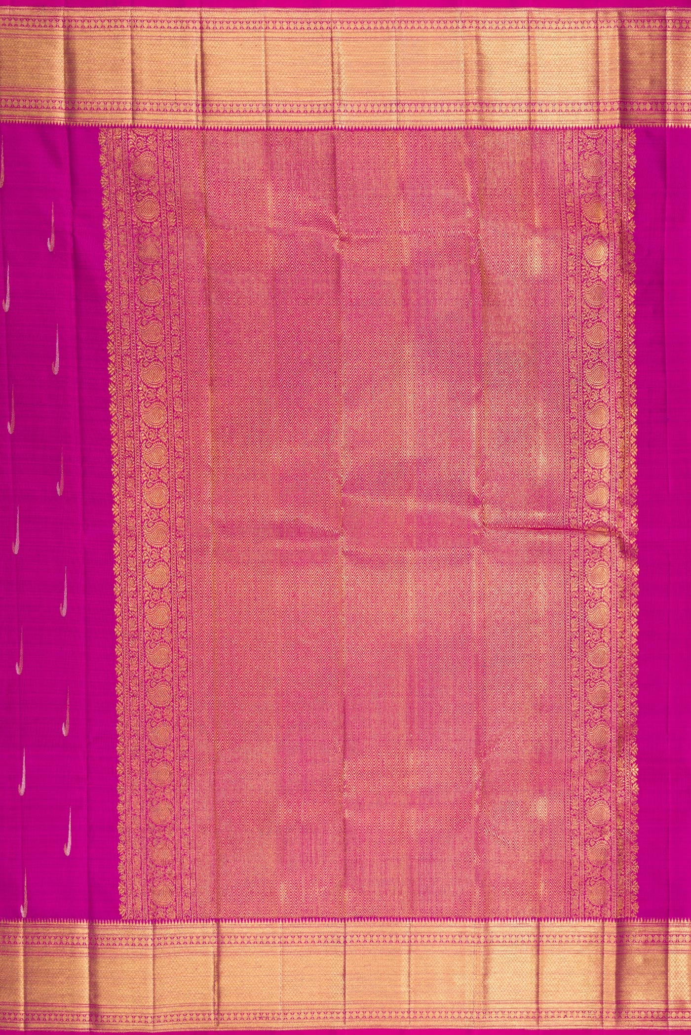 Close up image of the pallu of Magenta Kanchipuram Silk Saree with Zari Butta on the body and Zari Border. 