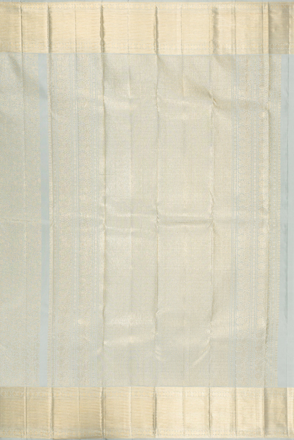 Close up image of the pallu of Grey Kanchipuram Silk Saree with Zari Brocade on the body and Zari Border. 