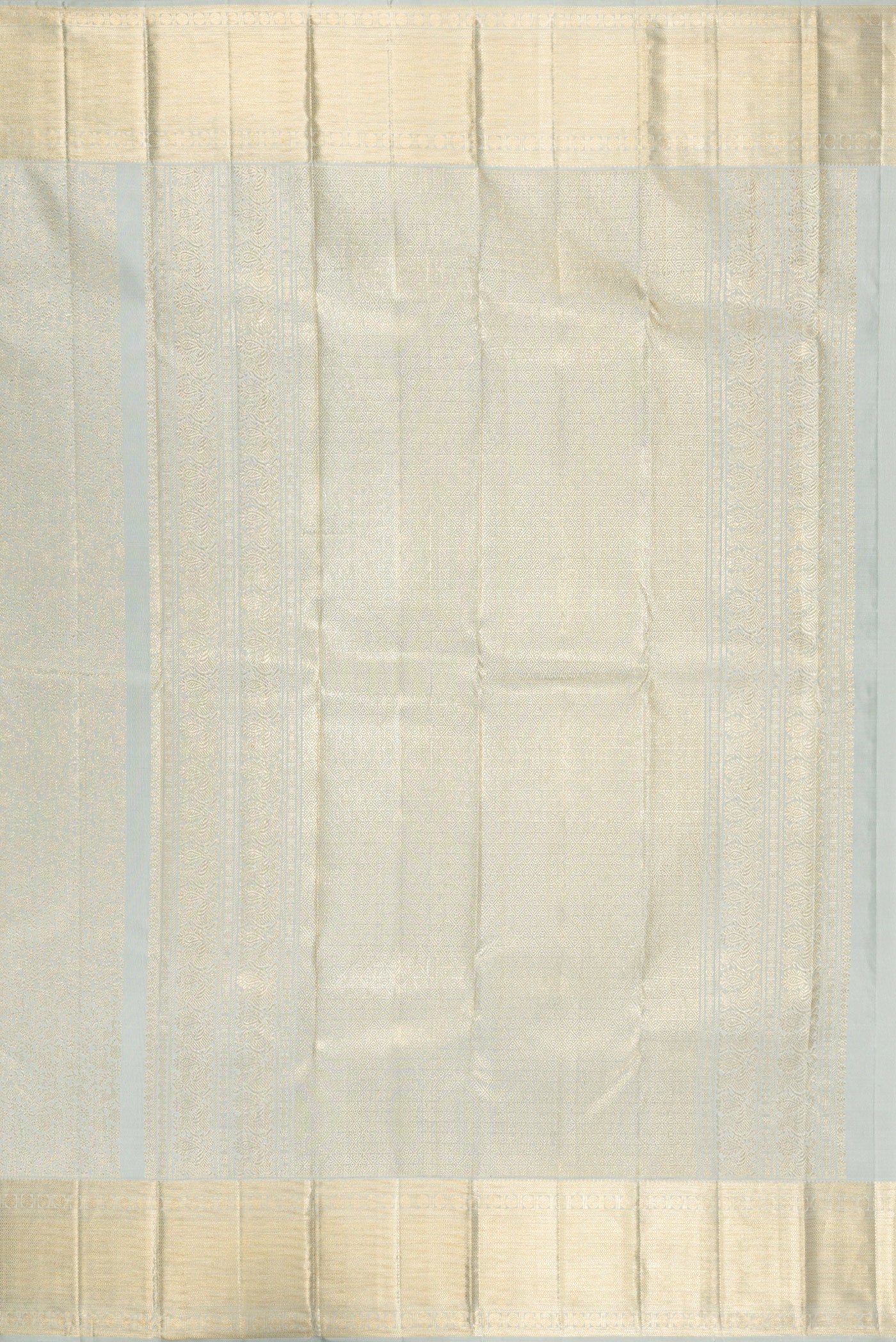 Close up image of the pallu of Grey Kanchipuram Silk Saree with Zari Brocade on the body and Zari Border. 