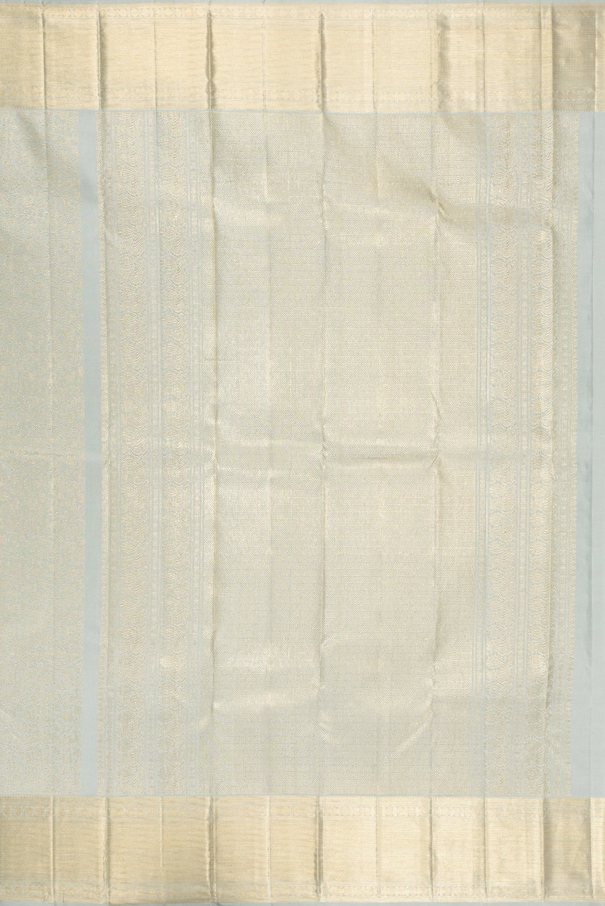 Close up image of the pallu of Grey Kanchipuram Silk Saree with Zari Brocade on the body and Zari Border. 