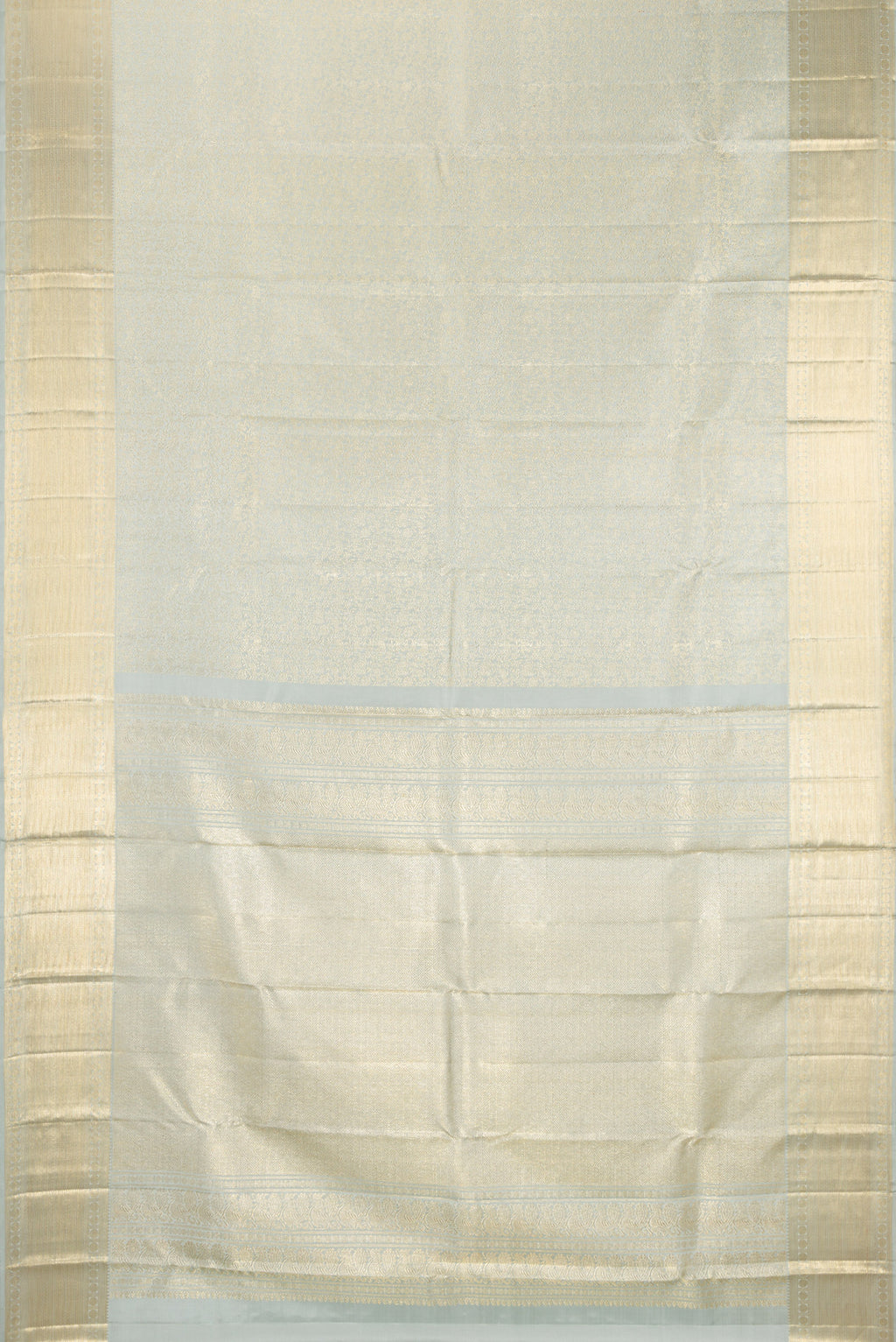 Flat view of Grey Kanchipuram Silk Saree with Zari Brocade on the body and Zari Border. 