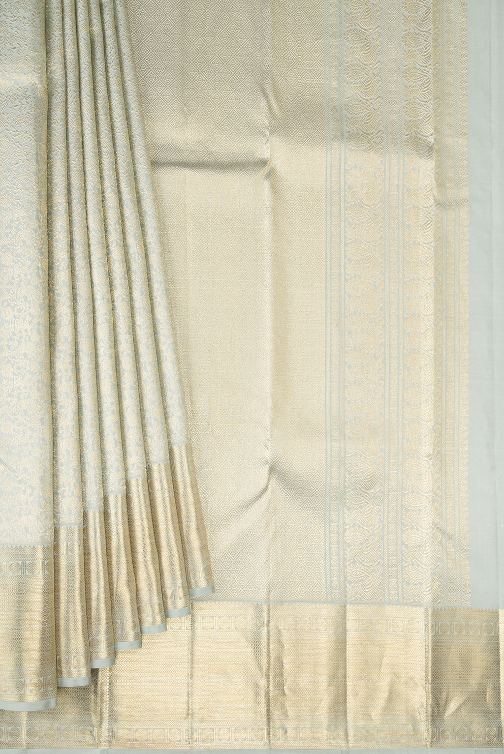 Pleats and pallu of Grey Kanchipuram Silk Saree with Zari Brocade on the body and Zari Border. 