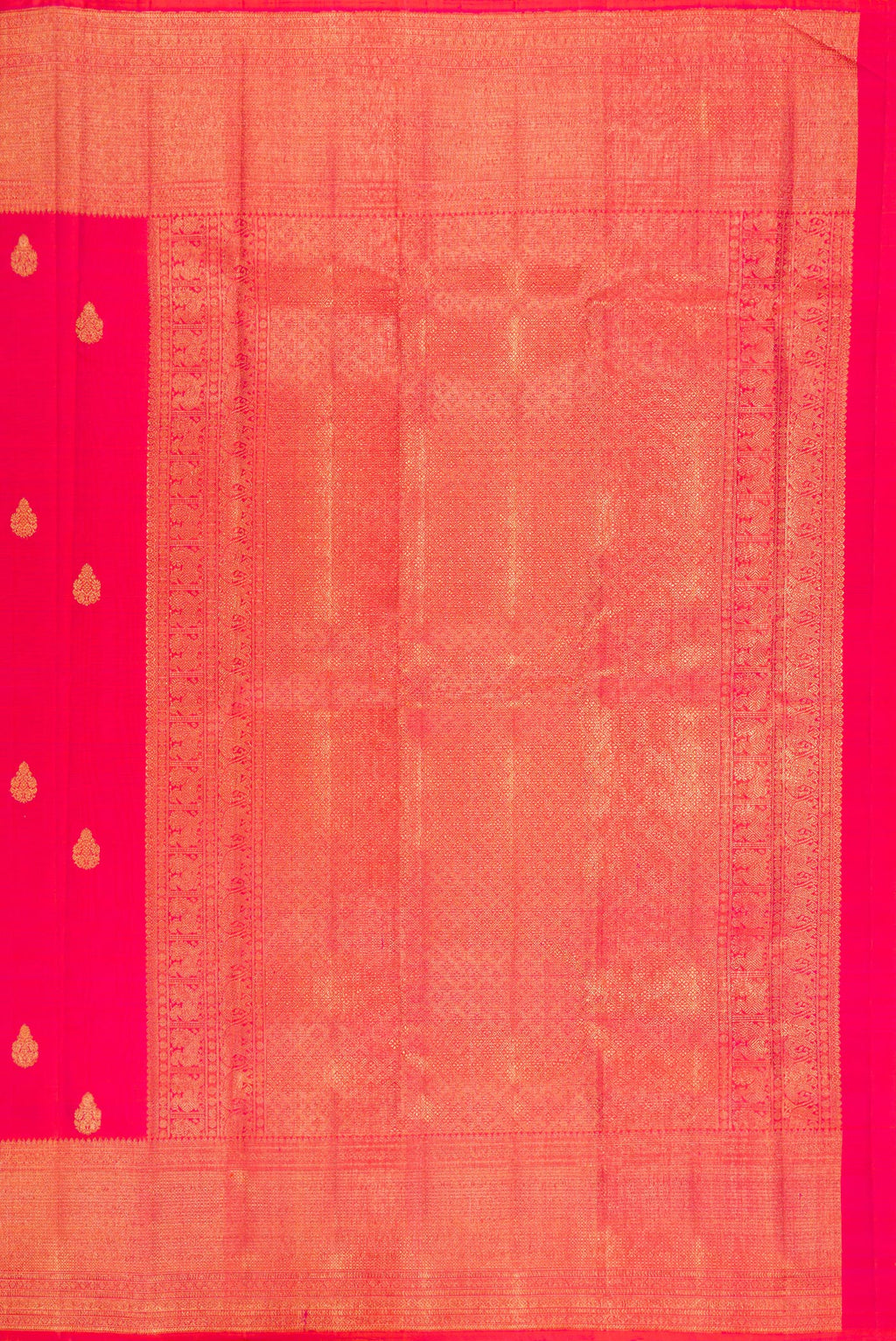 Close up image of the pallu of Pink Kanchipuram Silk Saree with Zari Butta on the body and Zari Border. 