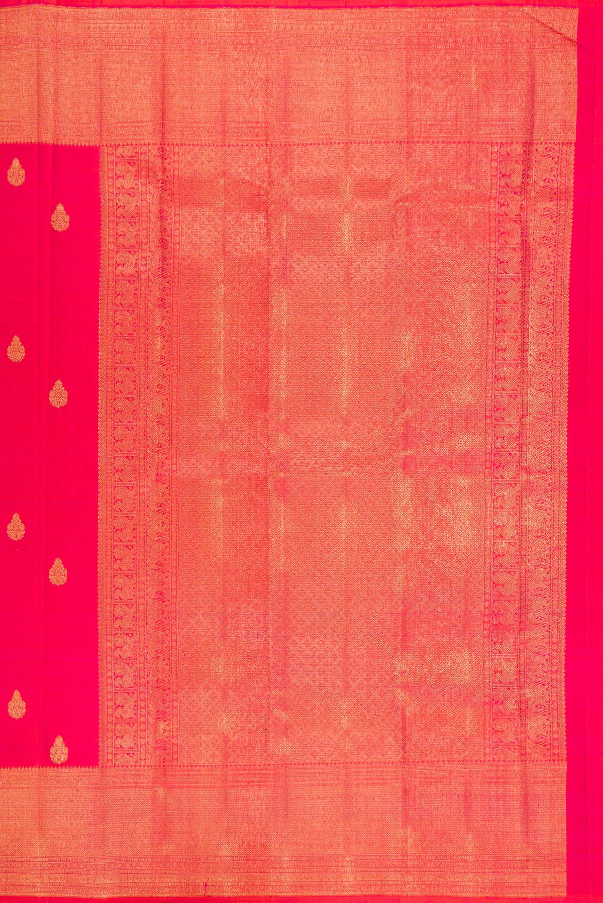 Close up image of the pallu of Pink Kanchipuram Silk Saree with Zari Butta on the body and Zari Border. 