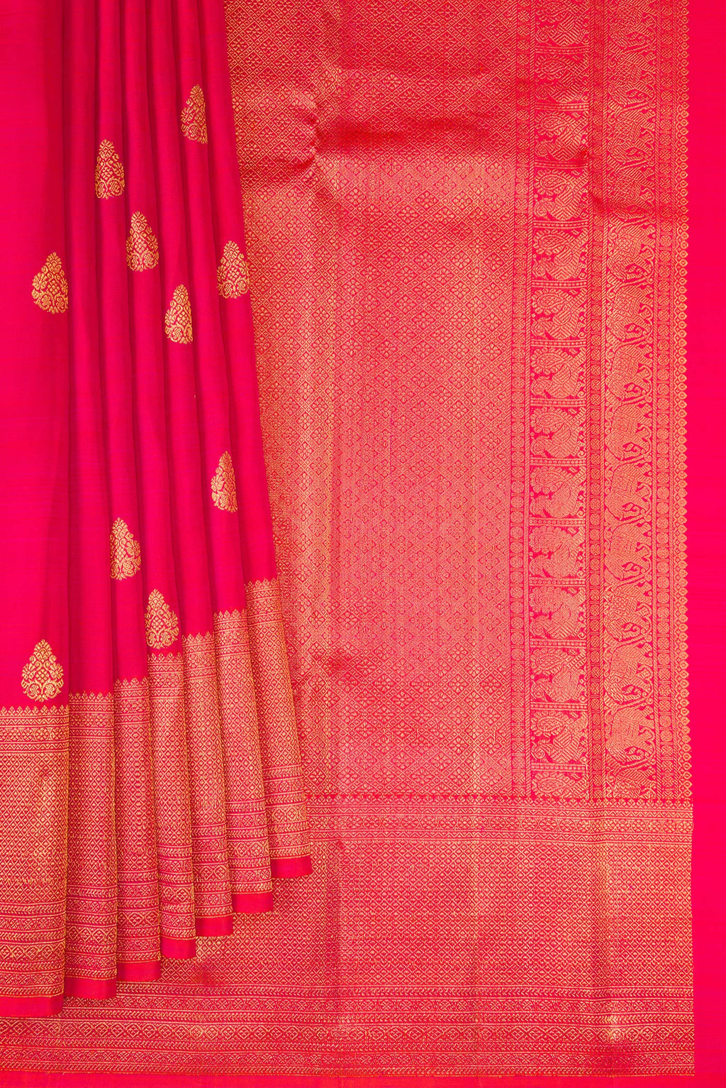 Pleats and pallu of Pink Kanchipuram Silk Saree with Zari Butta on the body and Zari Border. 