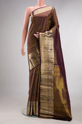 Pure Silk Burgundy Dual Tone Kanchipuram Saree with Zari Brocade on the body and Zari Border.  displayed on a mannequin