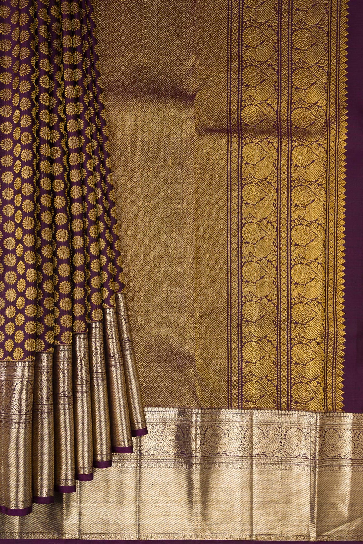 Pleats and pallu of Pure Silk Burgundy Dual Tone Kanchipuram Saree with Zari Brocade on the body and Zari Border. 
