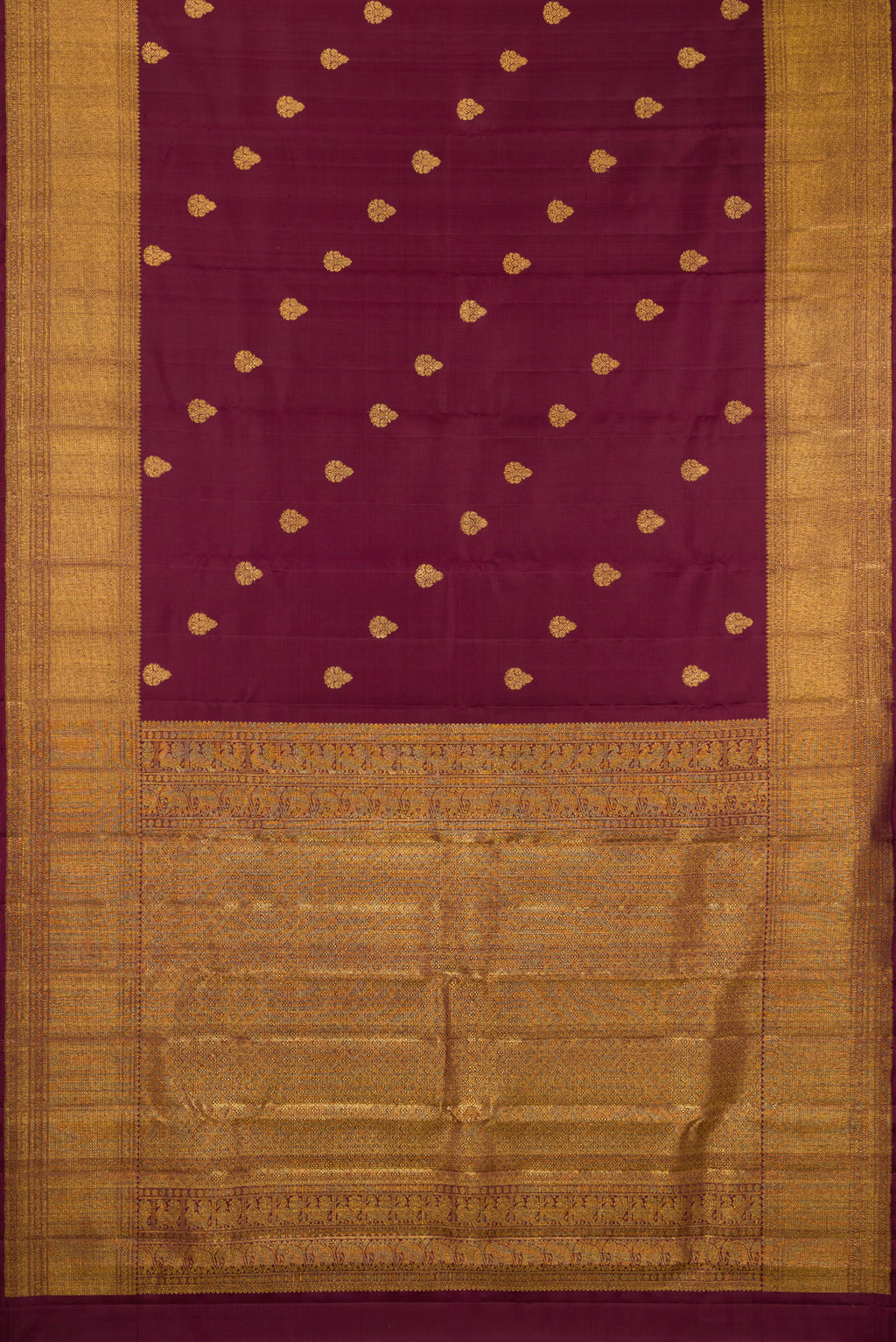 Flat view of Coffee Brown Kanchipuram Silk Saree with Zari Butta on the body and Zari Border. 