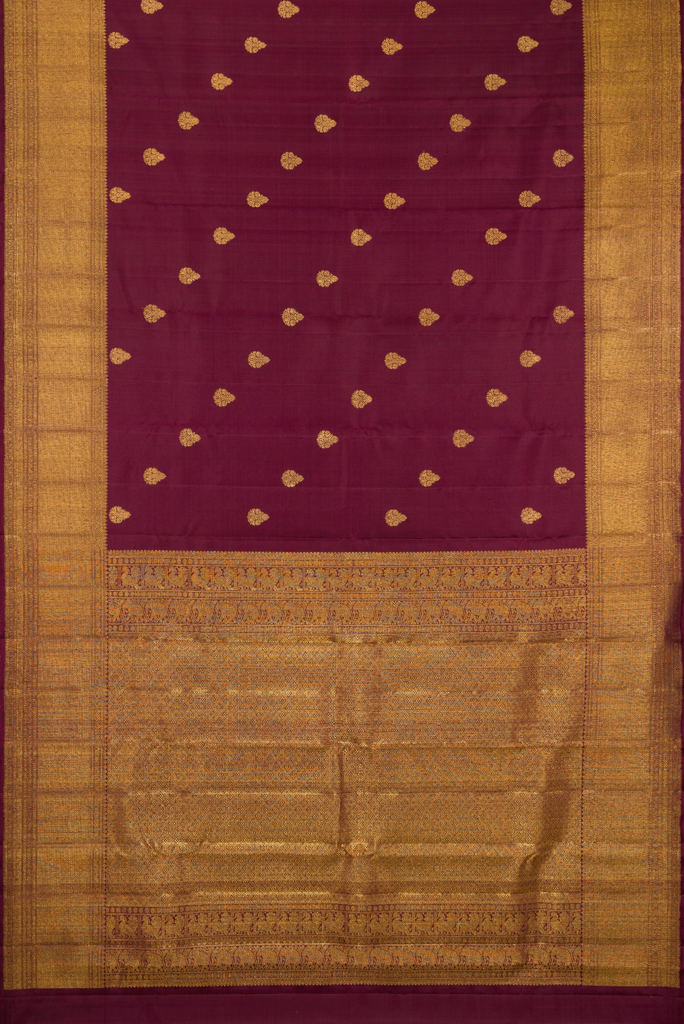 Flat view of Coffee Brown Kanchipuram Silk Saree with Zari Butta on the body and Zari Border. 