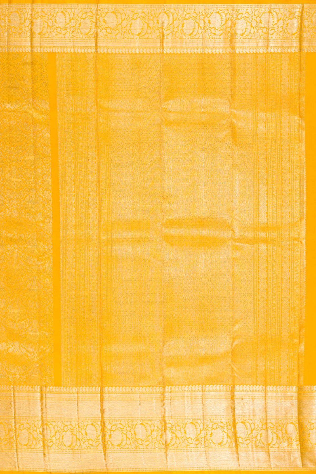 Close up image of the pallu of Pure Silk Yellow Kanchipuram Saree with Zari Brocade on the body and Fancy Border. 