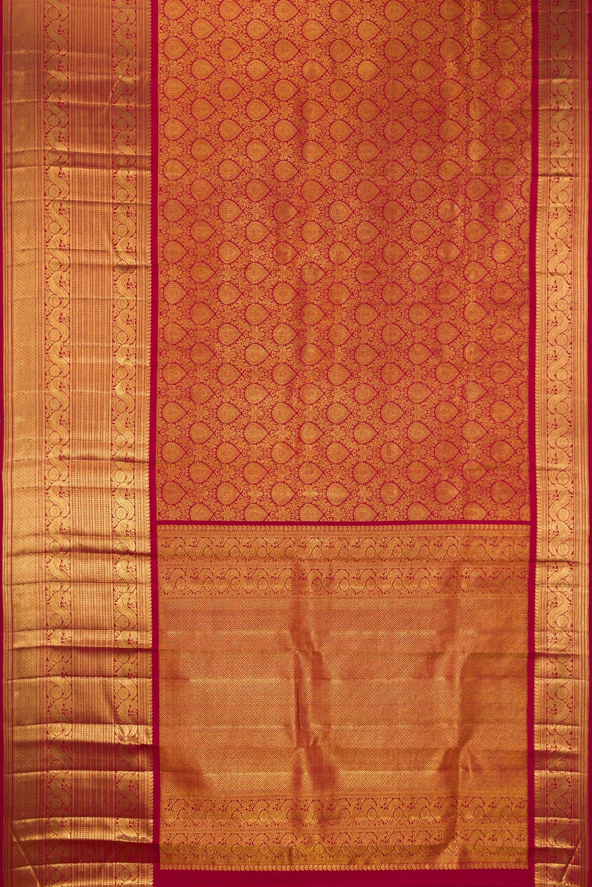Flat view of Pure Silk Maroon Kanchipuram Saree with Zari Brocade on the body and Zari Border. 