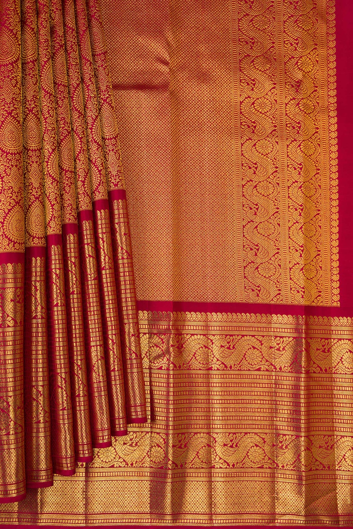 Pleats and pallu of Pure Silk Maroon Kanchipuram Saree with Zari Brocade on the body and Zari Border. 