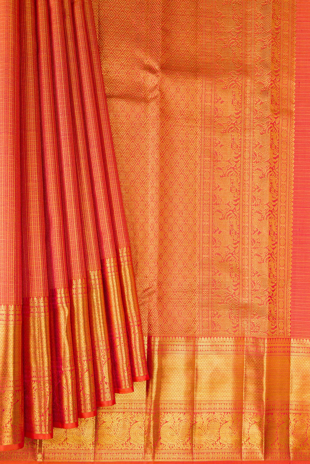 Pleats and pallu of Orange Kanchipuram Silk Saree with Checked design on the body and Zari Border. 