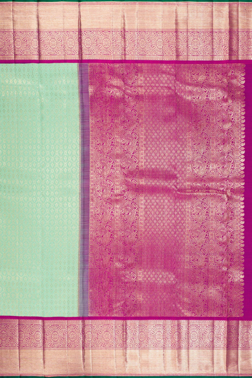 Close up image of the pallu of Pure Silk Green Kanchipuram Saree with Zari Brocade on the body and Zari Border. 