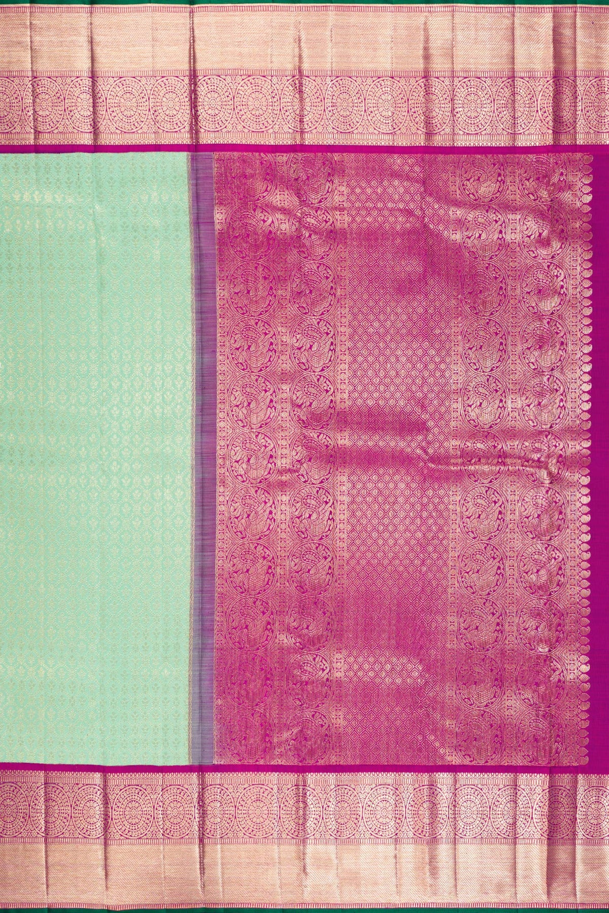 Close up image of the pallu of Pure Silk Green Kanchipuram Saree with Zari Brocade on the body and Zari Border. 