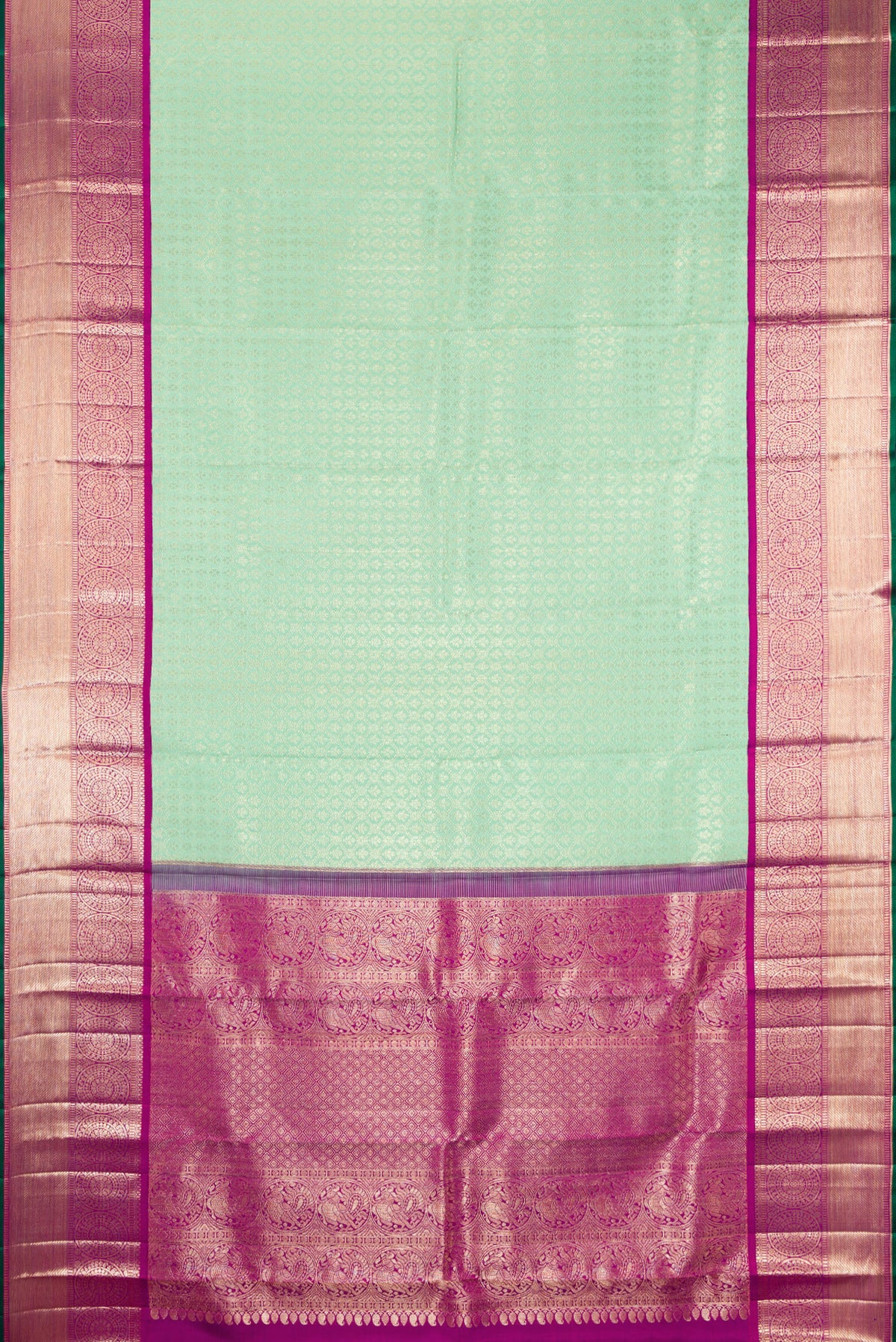 Flat view of Pure Silk Green Kanchipuram Saree with Zari Brocade on the body and Zari Border. 