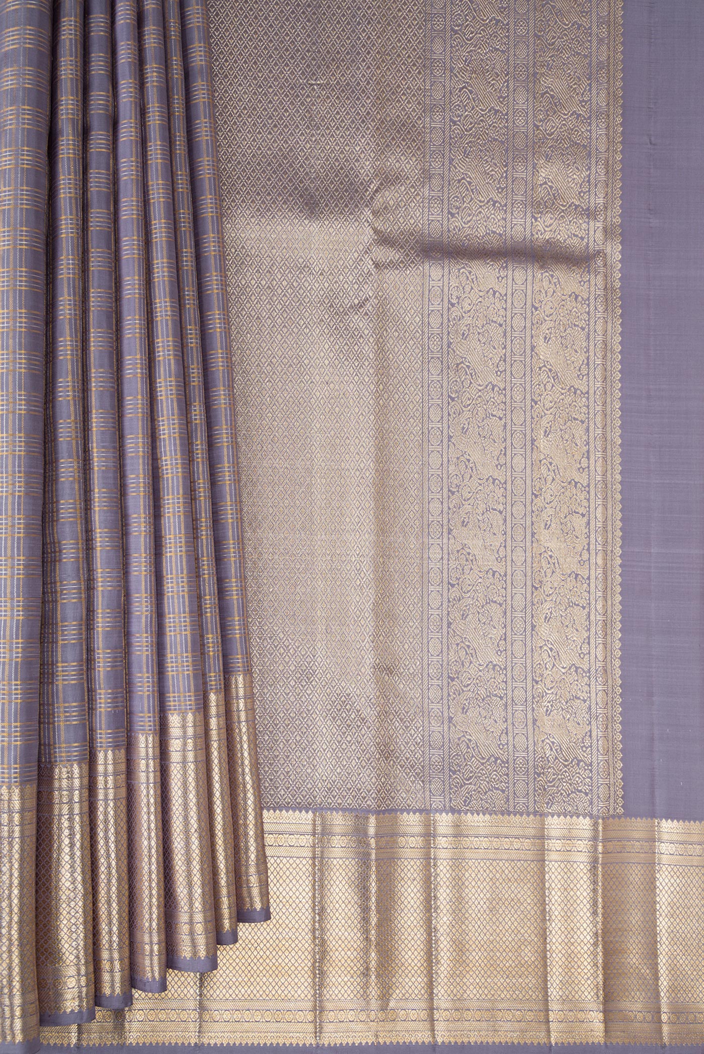 Pleats and pallu of Grey Kanchipuram Silk Saree with Checked design on the body and Zari Border. 
