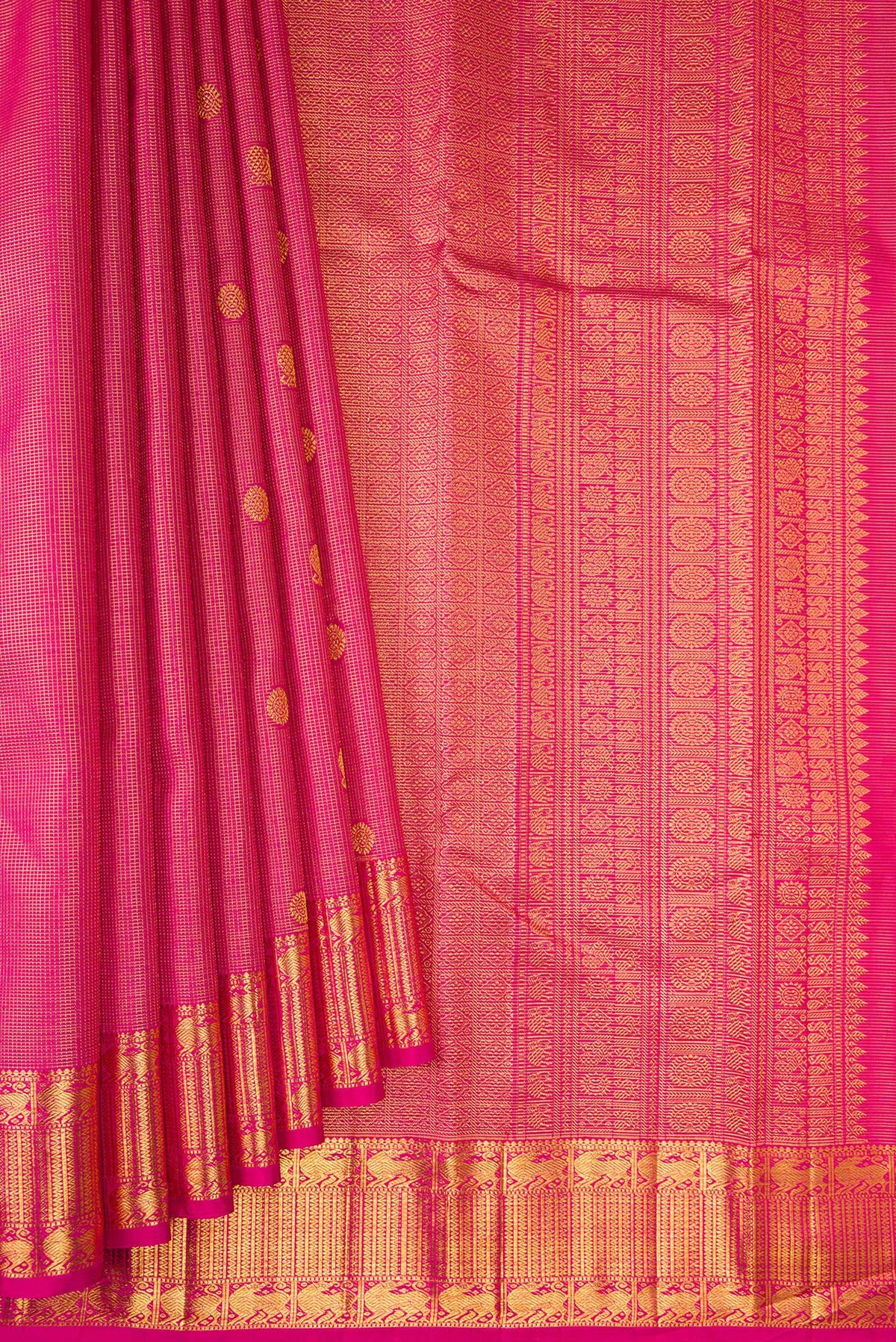 Pleats and pallu of Pure Silk Dark Pink Kanchipuram Saree with Zari Brocade on the body and Zari Border. 
