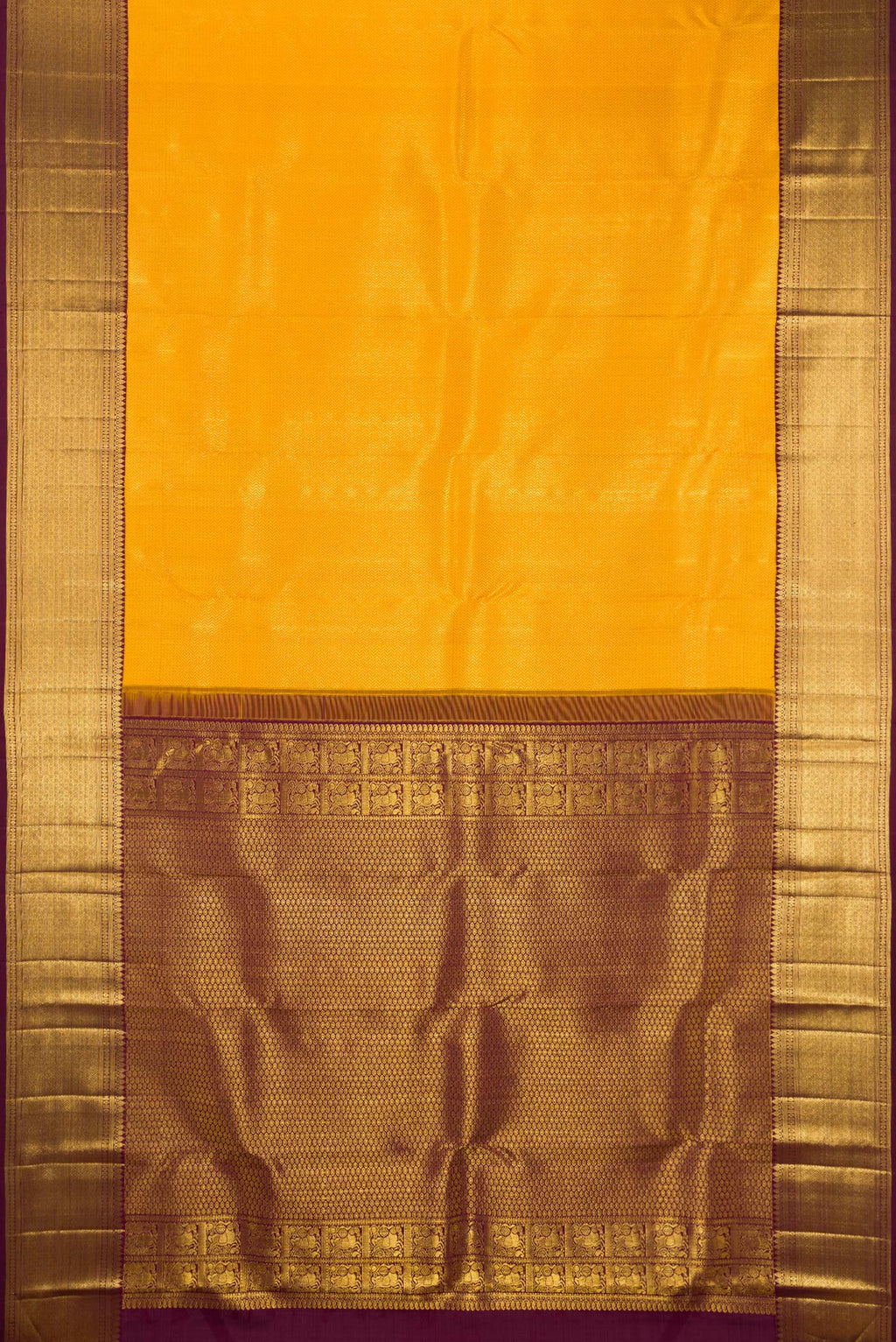 Flat view of Pure Silk Yellow Kanchipuram Saree with Zari Brocade on the body and Zari Border. 