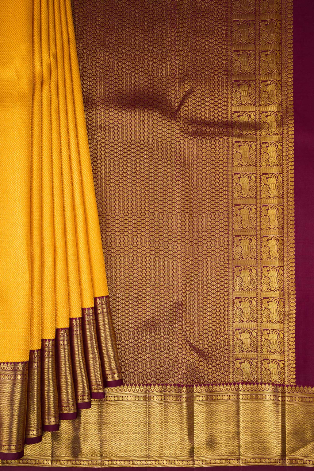 Pleats and pallu of Pure Silk Yellow Kanchipuram Saree with Zari Brocade on the body and Zari Border. 