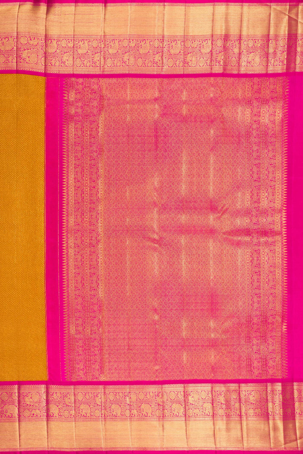 Close up image of the pallu of Mustard Kanchipuram Tissue Saree with Zari Brocade on the body and Zari Border. 