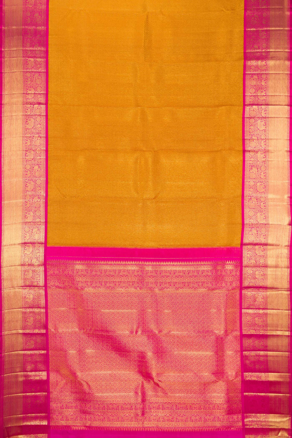 Flat view of Mustard Kanchipuram Tissue Saree with Zari Brocade on the body and Zari Border. 