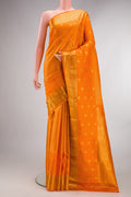 Pure Silk Orange Kanchipuram Saree with Checked design on the body and Fancy Border.  displayed on a mannequin