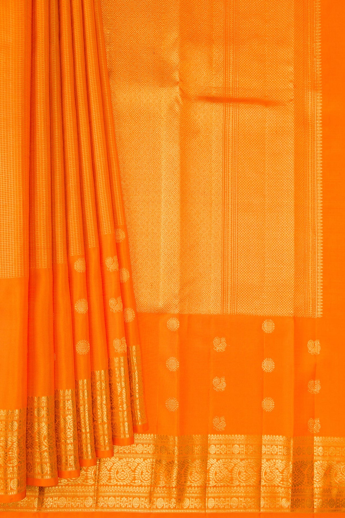 Pleats and pallu of Pure Silk Orange Kanchipuram Saree with Checked design on the body and Fancy Border. 