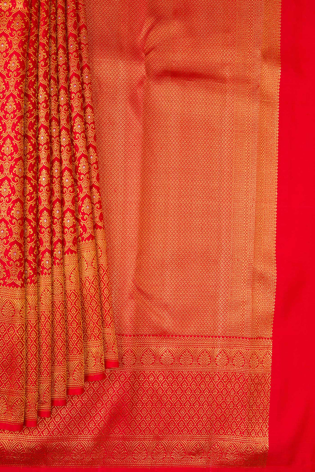 Pleats and pallu of Pure Silk Red Kanchipuram Saree with Zari Brocade on the body and Fancy Border. 