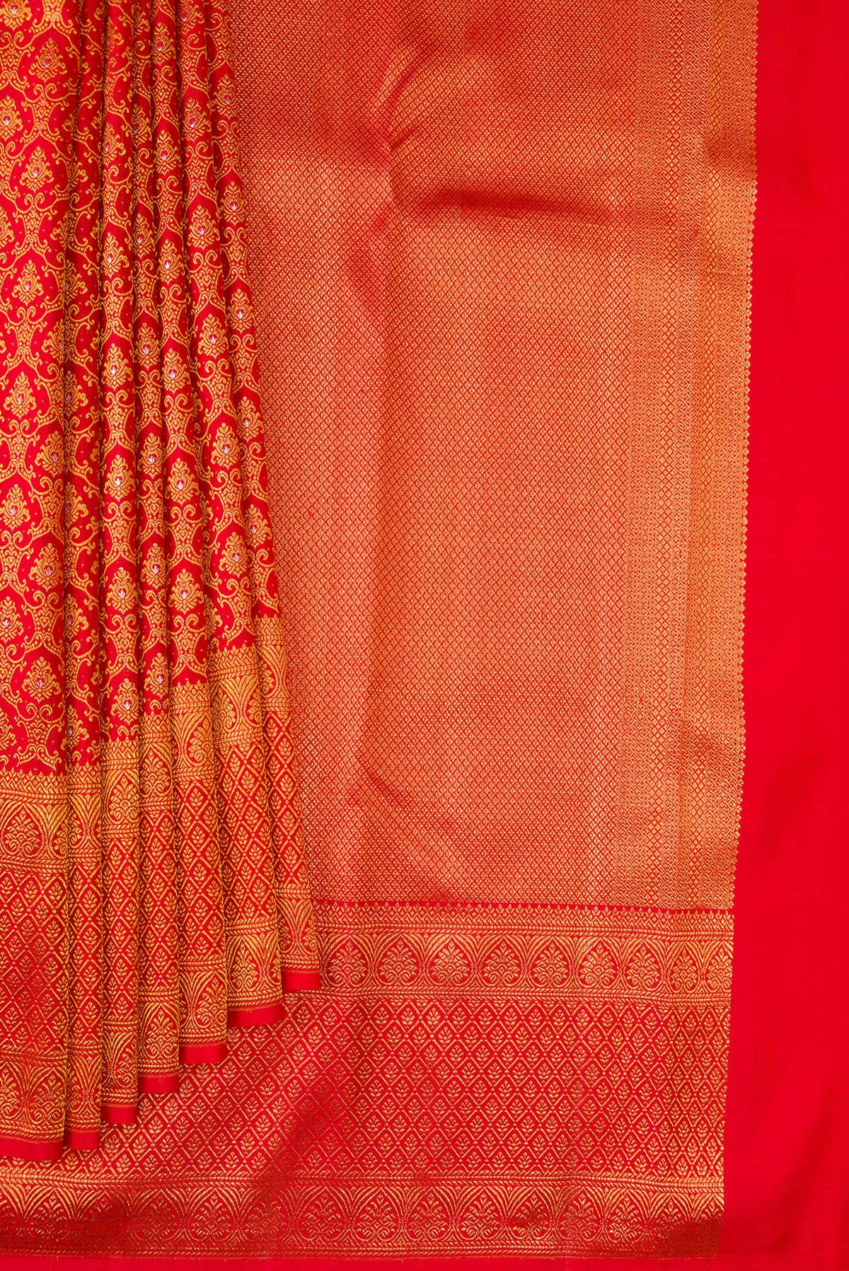 Pleats and pallu of Pure Silk Red Kanchipuram Saree with Zari Brocade on the body and Fancy Border. 