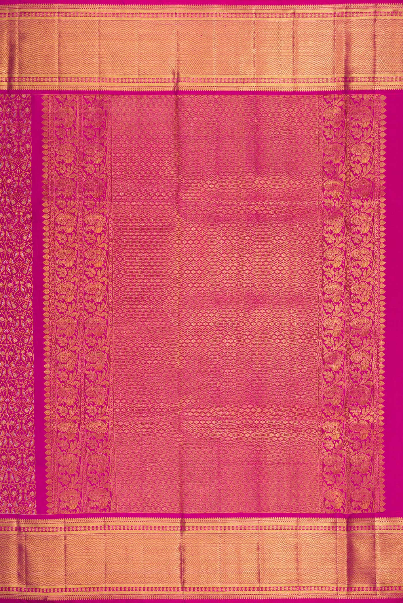 Close up image of the pallu of Magenta Kanchipuram Silk Saree with Zari Brocade on the body and Zari Border. 