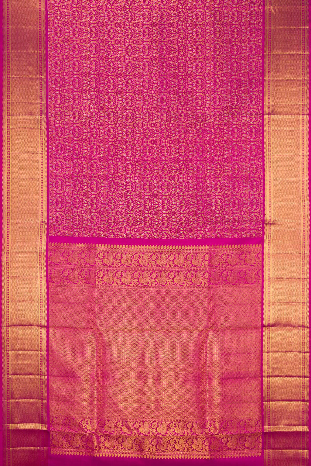 Flat view of Magenta Kanchipuram Silk Saree with Zari Brocade on the body and Zari Border. 