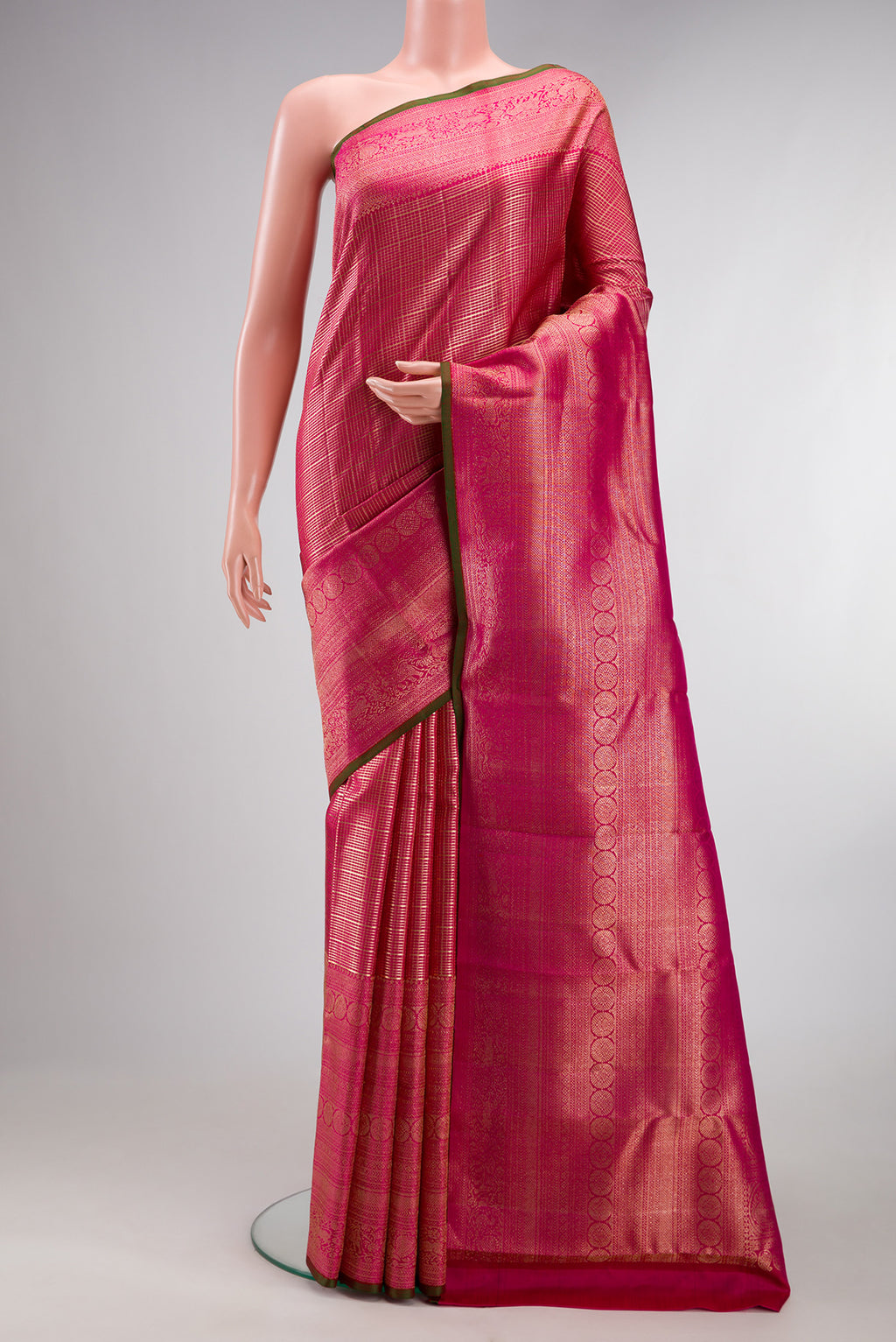 Pure Silk Dark Pink Kanchipuram Saree with Zari Brocade on the body and Fancy Border.  displayed on a mannequin