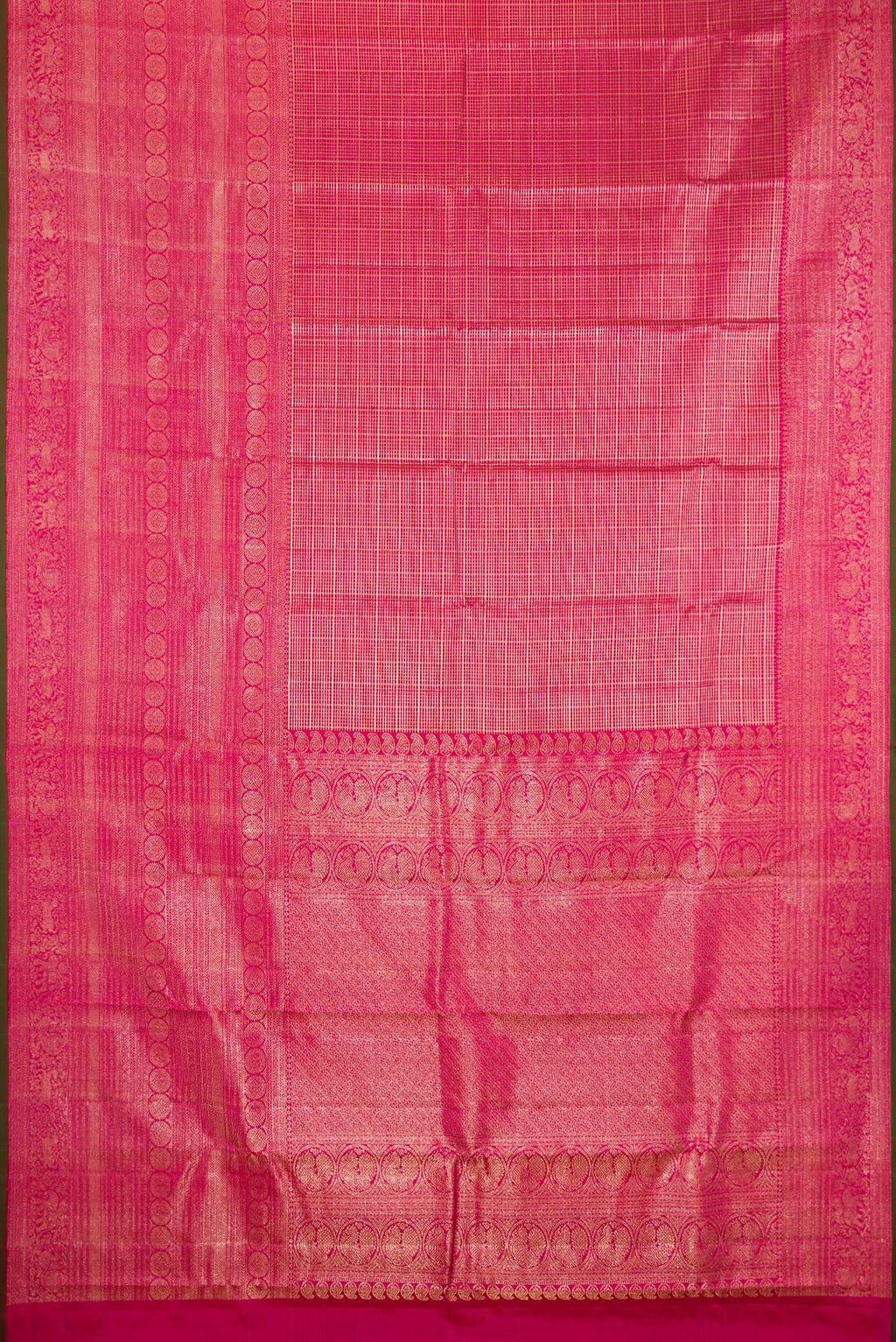Flat view of Pure Silk Dark Pink Kanchipuram Saree with Zari Brocade on the body and Fancy Border. 