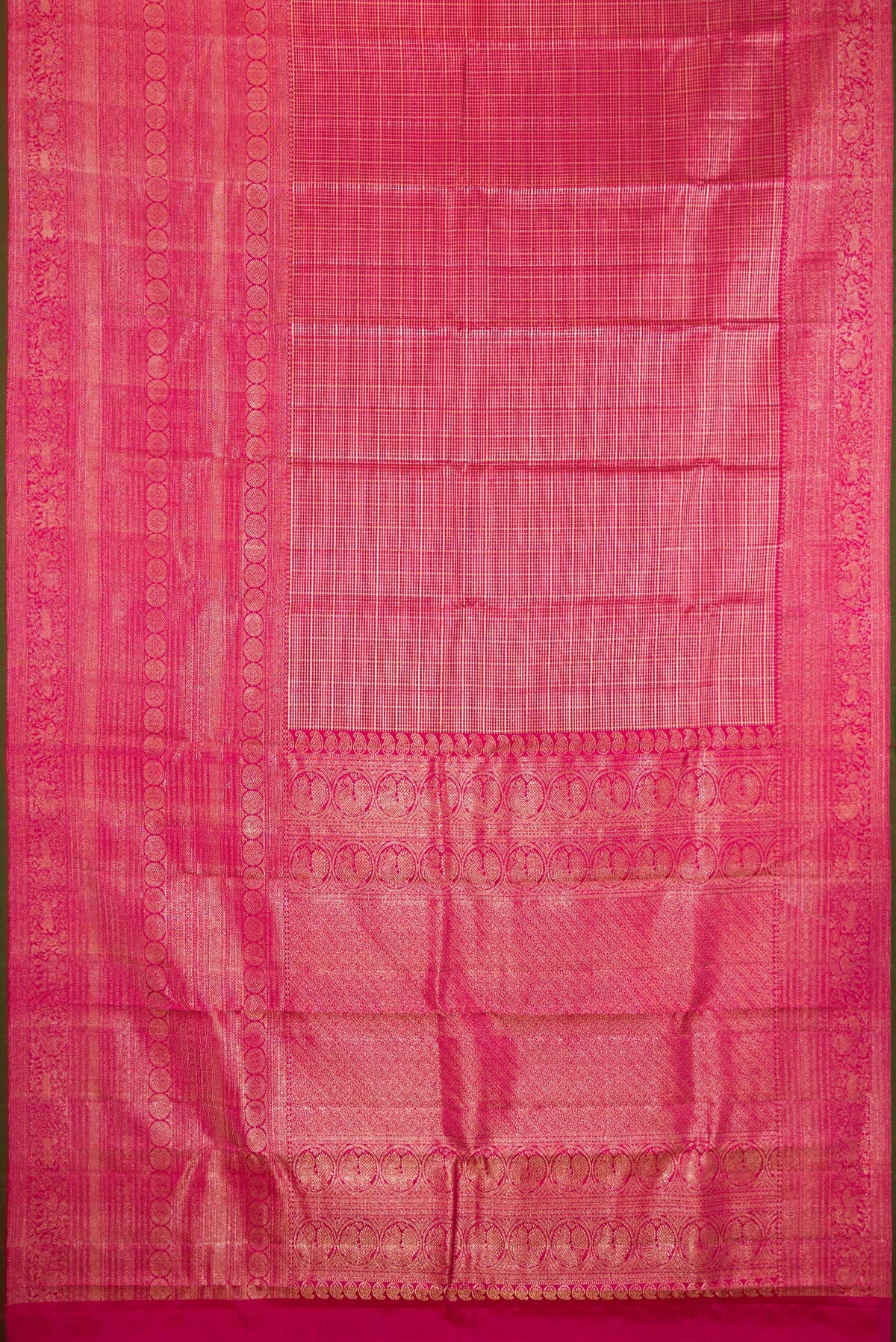 Flat view of Pure Silk Dark Pink Kanchipuram Saree with Zari Brocade on the body and Fancy Border. 
