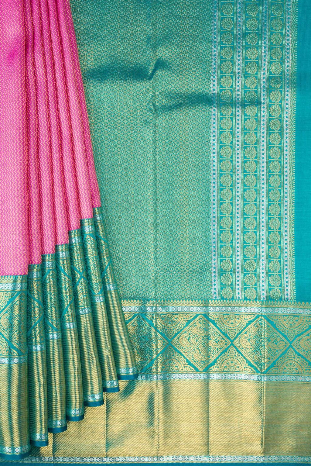 Pleats and pallu of Pure Silk Rose pink Kanchipuram Saree with Zari Brocade on the body and Fancy Border. 