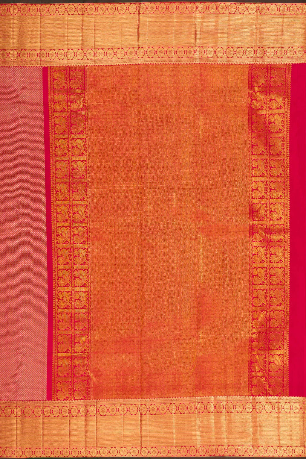 Close up image of the pallu of Pure Silk Maroon Dual Tone Kanchipuram Saree with Zari Brocade on the body and Zari Border. 
