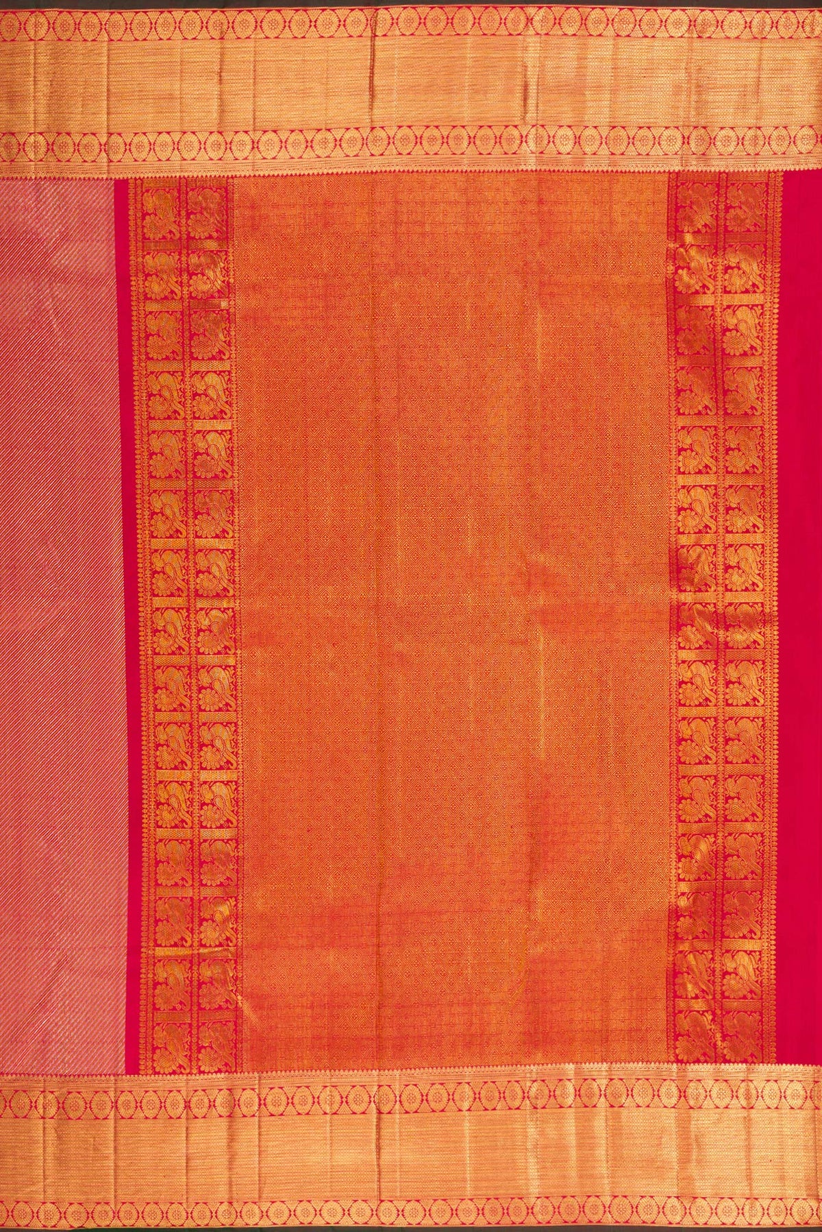 Close up image of the pallu of Pure Silk Maroon Dual Tone Kanchipuram Saree with Zari Brocade on the body and Zari Border. 