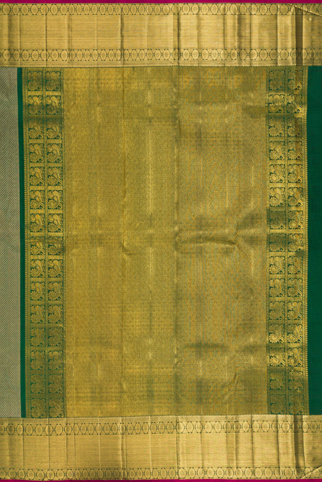 Close up image of the pallu of Pure Silk Bottle Green Kanchipuram Saree with Zari Brocade on the body and Zari Border. 