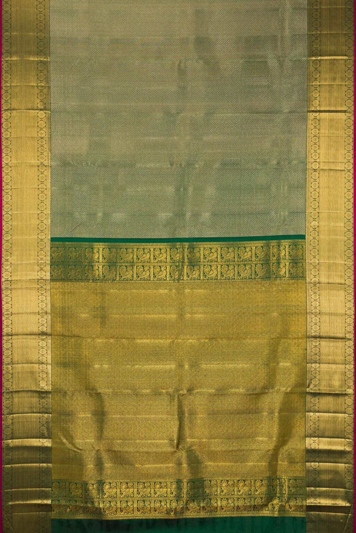 Flat view of Pure Silk Bottle Green Kanchipuram Saree with Zari Brocade on the body and Zari Border. 
