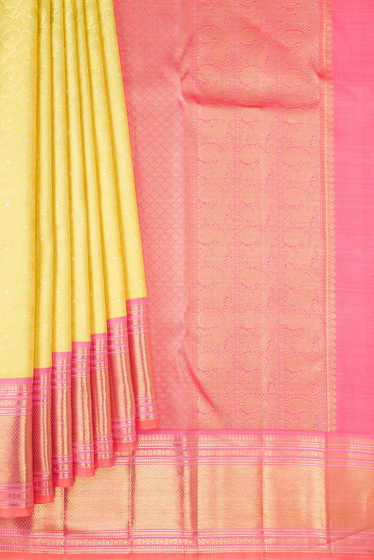 Pleats and pallu of Pure Silk Lemon Yellow Kanchipuram Saree with Zari Brocade on the body and Zari Border. 