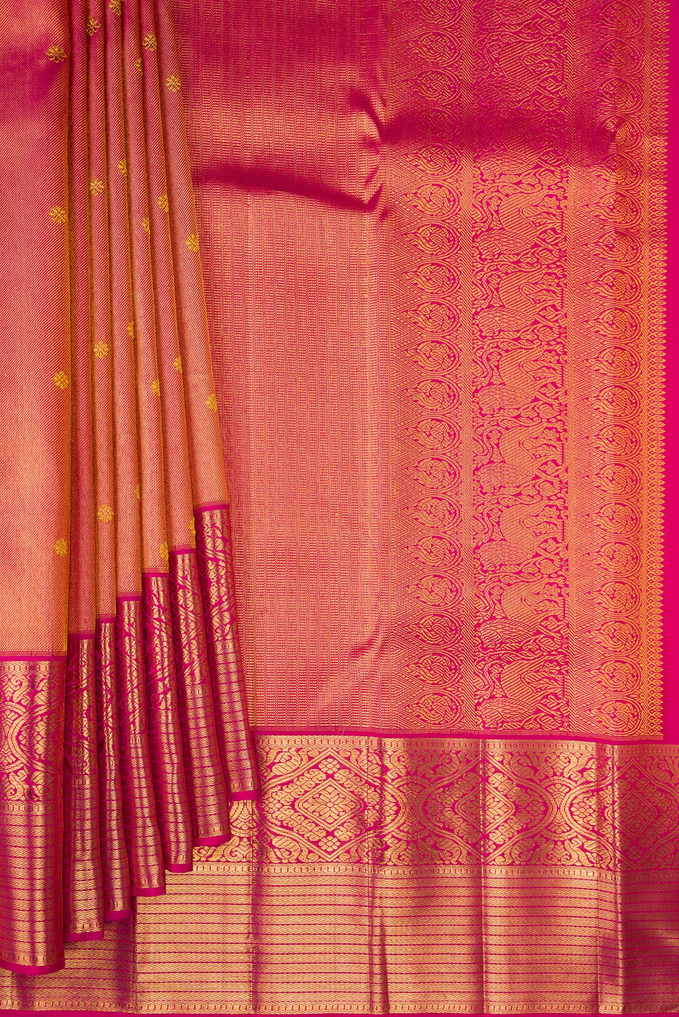 Pleats and pallu of Dark Pink Kanchipuram Silk Saree with Zari Brocade on the body and Zari Border. 