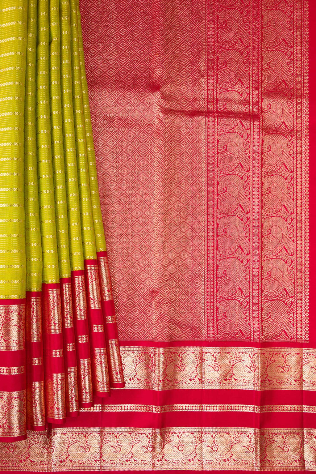 Pleats and pallu of Pure Silk Parrot Green Kanchipuram Saree with Stripes on the body and Fancy Border. 