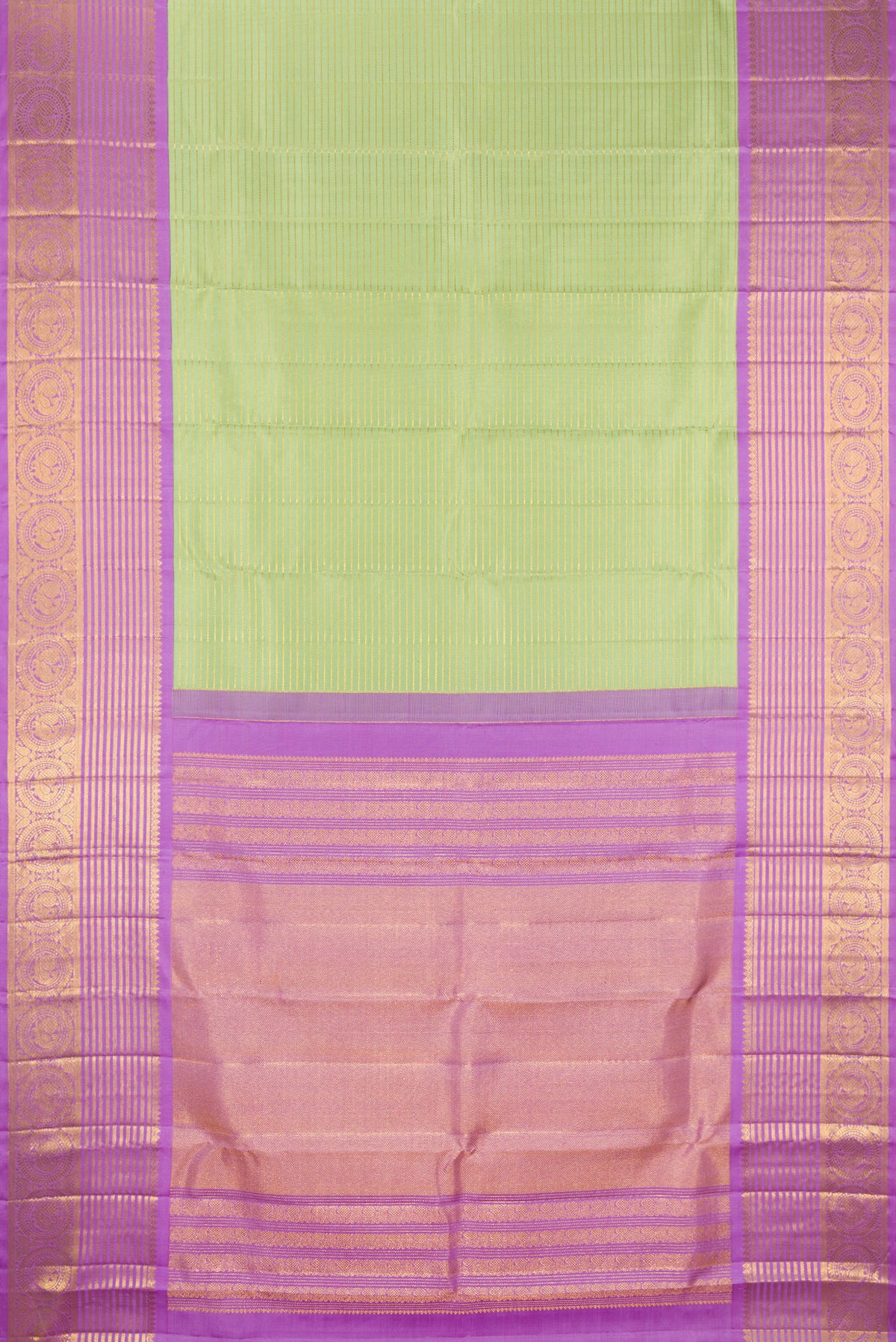 Flat view of Pure Silk Pista Green Kanchipuram Saree with Stripes on the body and Zari Border. 