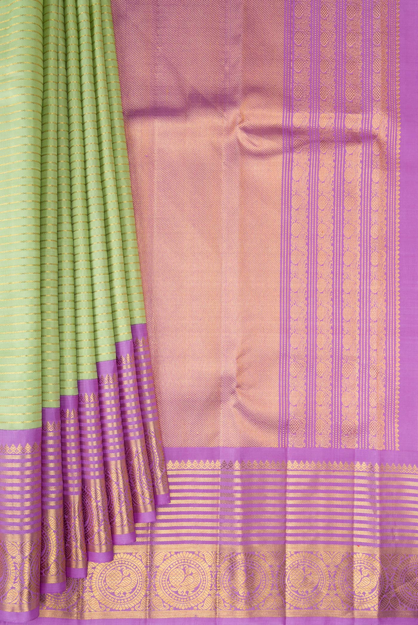 Pleats and pallu of Pure Silk Pista Green Kanchipuram Saree with Stripes on the body and Zari Border. 