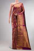 Pure Silk Magenta Kanjivaram Saree with Zari Brocade on the body and Zari Border.  displayed on a mannequin