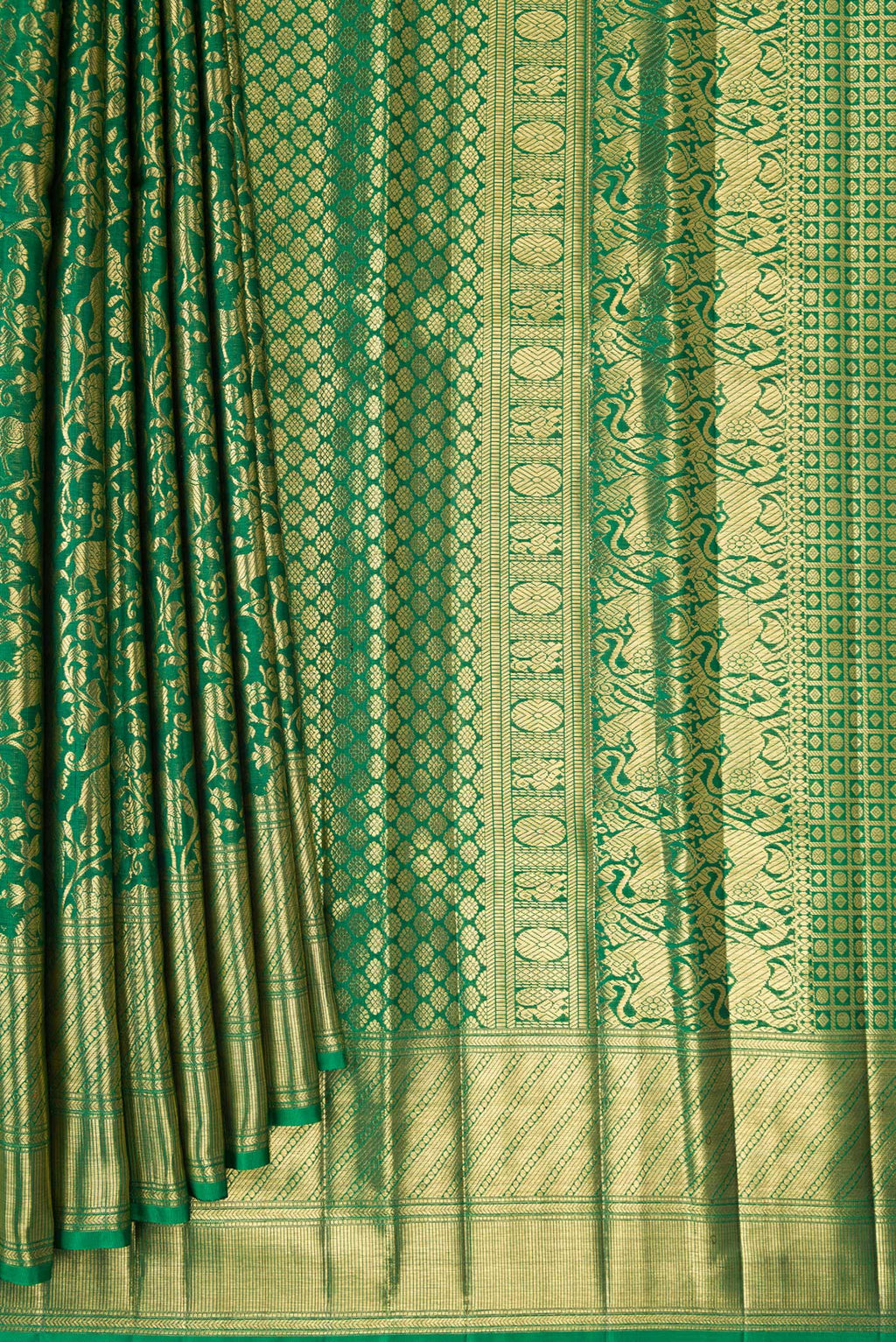 Pleats and pallu of Green Kanjivaram Silk Saree with Zari Brocade on the body and Zari Border. 